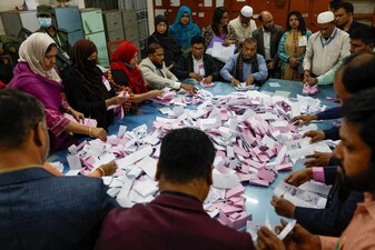 Electoral workers sort the ballots before counting the votes, during the 13th general election in Dhaka, Bangladesh. File image/Reuters