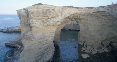 A drone view of the Torre Sant'Andrea (known as the Love Arch), in Lecce, Italy, May 23, 2017, in this screengrab obtained from social media. Aerialpictures.it/via REUTERS