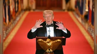 US President Donald Trump speaks during a dinner with state governors in the East Room of the White House in Washington, DC, on February 21, 2026. (Photo by Mandel NGAN / AFP)