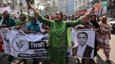 Women supporters of Bangladesh Nationalist Party (BNP) chant slogans as they join in an election campaign in Dhaka, Bangladesh, January 28, 2026. File Image/Reuters