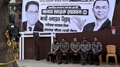 Police officers sit outside a party office of Bangladesh Nationalist Party (BNP), a day after the national election in Dhaka, Bangladesh, February 13, 2026. File Image/Reuters
