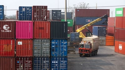A person drives a truck inside a shipping container yard in Navi Mumbai, India, February 4, 2026. File Image/Reuters