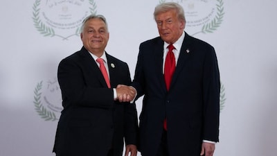 US President Donald Trump and Hungarian Prime Minister Viktor Orban shake hands at a summit about the US-brokered Israel-Hamas deal at Sharm el-Sheikh, Egypt, on October 13, 2025. (Photo: Suzanne Plunkett/Pool)