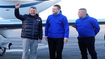 Denmark's King Frederik is welcomed at Nuuk Airport by Greenlandic Prime Minister Jens-Frederik Nielsen and Speaker of the Greenlandic Parliament Kim Kielsen, in Nuuk, Greenland, on Thursday. Reuters
