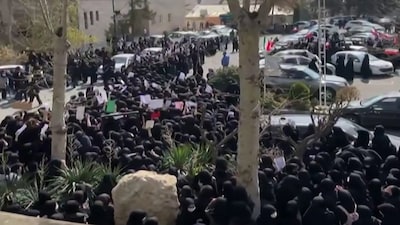 This video grab taken from UGC images posted on social media on Monday, and verified by AFPTV teams in Paris, shows students gathering for an anti-government rally at the all-female Alzahra university in Tehran. AFP
