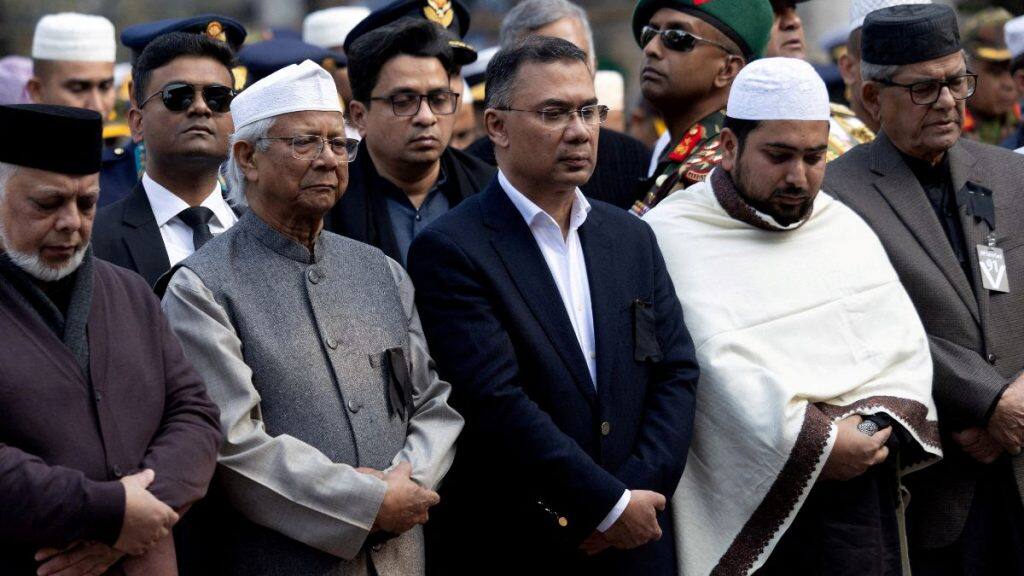 Muhammad Yunus, Chief Advisor of the interim government of Bangladesh, along with Bangladesh Nationalist Party (BNP) acting chairman Tarique Rahman, offer a funeral prayer for Bangladesh's former Prime Minister Khaleda Zia at the Parliament building area of Manik Mia Avenue, in Dhaka, Bangladesh, December 31, 2025. File Image/Reuters