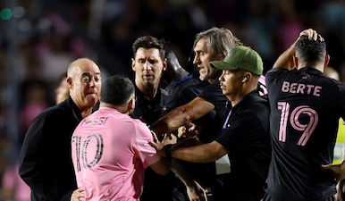 Lionel Messi was mobbed by fans on the pitch during Inter Miami’s friendly against Independiente del Valle in Puerto Rico. Image: Reuters 