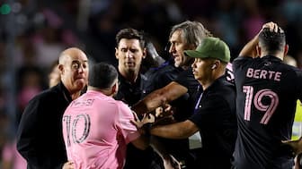 Lionel Messi was mobbed by fans on the pitch during Inter Miami’s friendly against Independiente del Valle in Puerto Rico. Image: Reuters 