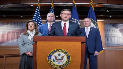 Speaker of the House Mike Johnson, R-La., center, joined from left by Rep. Lisa McClain, R-Mich., chair of the House Republican Conference, Majority Whip Tom Emmer, R-Minn., and Majority Leader Steve Scalise, R-La., meets with reporters ahead of a key procedural vote to end the partial government shutdown, at the Capitol in Washington, Tuesday. AP