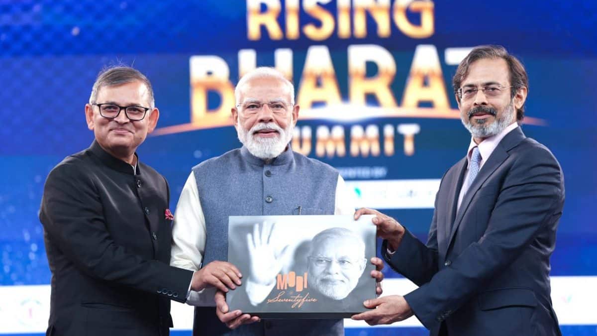 A life in 75 milestones: Network18 presents PM Narendra Modi a special edition book at Rising Bharat 2026