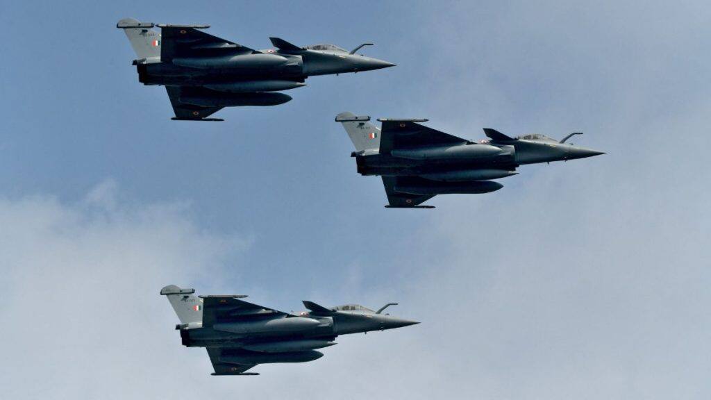 Indian Air Force's Rafale fighter jets fly past during the 