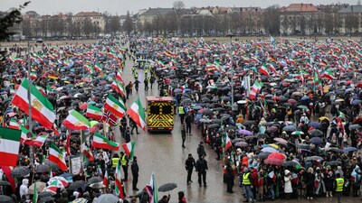 Hundreds of demonstrators with flags and umbrellas attend a demonstration of the Iranian opposition on February 14, 2026 at the Theresienwiese fair grounds in Munich, southern Germany, on the sidelines of the 62nd Munich Security Conference (MSC).- AFP
