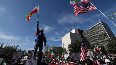 Demonstrators take part in a march in support of the people of Iran by members of the American-Iranian community in Los Angeles on February 14, 2026.- AFP