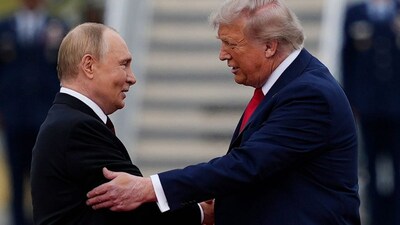 FILE - U.S. President Donald Trump greets Russian President Vladimir Putin, Aug. 15, 2025, at Joint Base Elmendorf-Richardson, Alaska. (AP Photo/Julia Demaree Nikhinson, File)