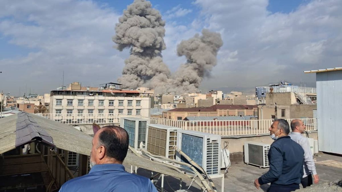 People watch as smoke rises on the skyline after an explosion in Tehran, Iran, Saturday, Feb. 28, 2026.(AP Photo)
People watch as smoke rises on the skyline after an explosion in Tehran, Iran, Saturday, Feb. 28, 2026.(AP Photo)