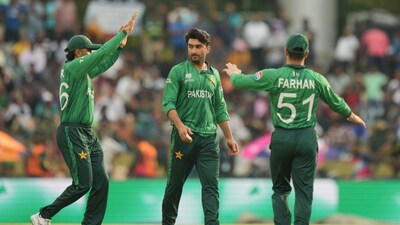 Pakistan pacer Salman Mirza celebrates with teammates after dismissing Namibia opener Jan Frylinck during their T20 World Cup Group A clash in Colombo. AP