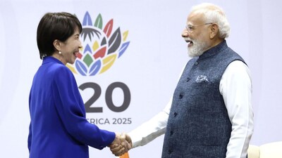 Japanese Prime Minister Sanae Takaichi shakes hands with Indian counterpart Narendra Modi in Johannesburg. (X)