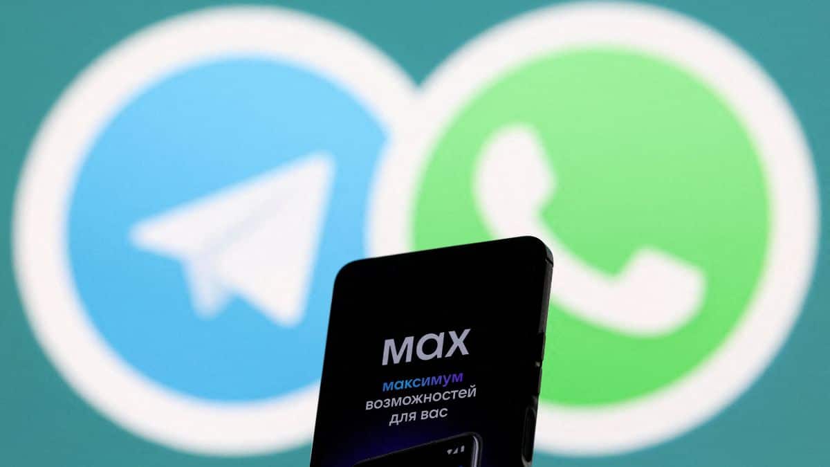 A web page of the Russian messenger app MAX displayed on a smartphone next to a screen showing the logo of WhatsApp and Telegram applications in this illustration taken September 4, 2025. File Image/Reuters