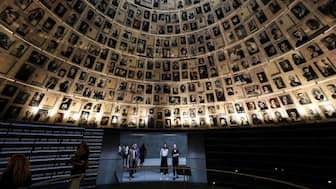 Visitors tour an exhibition, ahead of Israel's national Holocaust memorial day at Yad Vashem, the World Holocaust Remembrance Center, in Jerusalem, April 23, 2025. File Image/Reuters