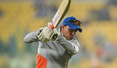 India's explosive batter Abhishek Sharma plays a shot with his bat at practice. Image: AFP