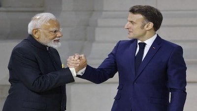 French President Emmanuel Macron with Prime Minister Narendra Modi. File image/AFP