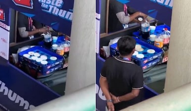 A screengrab from the viral video shows a vendor refilling the soft drink bottle. Image: X