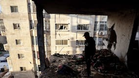 Israeli airstrikes kill 26 in Gaza as both sides trade accusations of violating ceasefire