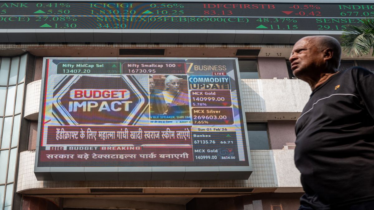 A pedestrian walks past a digital screen displaying a broadcast of the Budget speech by Finance Minister Nirmala Sitharaman at the Bombay Stock Exchange (BSE) in Mumbai. AFP A pedestrian walks past a digital screen displaying a broadcast of the Budget speech by Finance Minister Nirmala Sitharaman at the Bombay Stock Exchange (BSE) in Mumbai. AFP