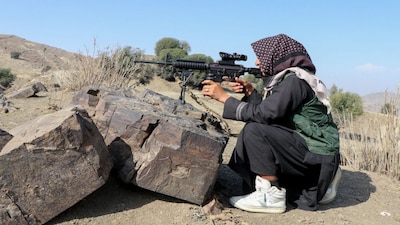 A Taliban security personnel keeps watch near the Durand Line in Gurbuz district of Khost following cross-border fighting between Pakistan and Afghanistan. AFP