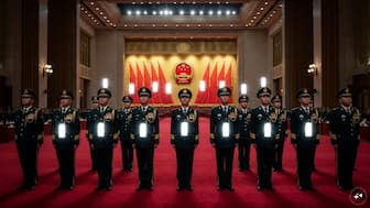 China removes nine military officials ahead of annual political meeting