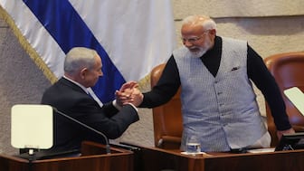 Israel's Prime Minister Benjamin Netanyahu greets Prime Minister Narendra Modi, during a special session of the Knesset, Israel's parliament, in Jerusalem. Reuters
