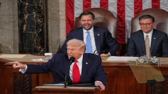 US President Donald Trump delivers the State of the Union address to a joint session of Congress in the House chamber at the US Capitol in Washington as Vice President JD Vance and House Speaker Mike Johnson listen. AP