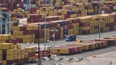 Containers are stacked at the Port of Long Beach in California. AP