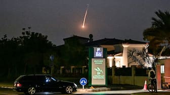 A projectile falls over Dubai on February 28, 2026. AFP file