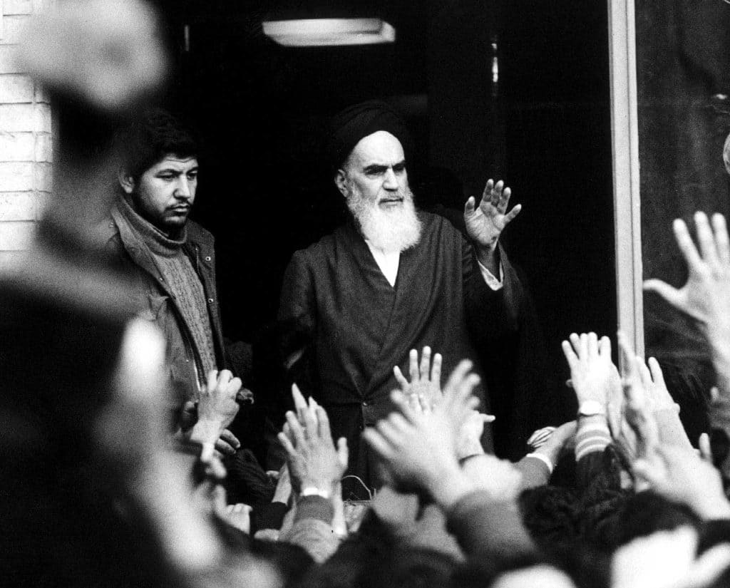 The leader and founder of the Islamic revolution Ayatollah Khomeini speak from a balcony of the Alavi school in Tehran during the country's revolution in February 1979. File Image/Reuters