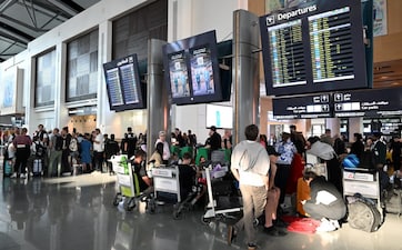 Passengers wait at Muscat International Airport as the Sultanate of Oman facilitates the return of passengers to their home countries amid the U.S.-Israeli conflict with Iran. REUTERS/File Photo