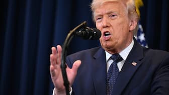 US President Donald Trump speaks to reporters during a news conference at Trump National Doral Miami  (AFP)