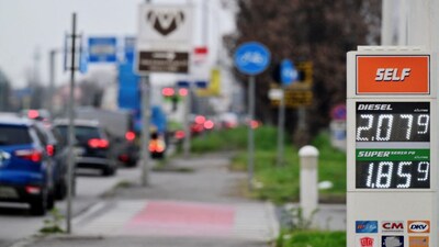 The price per litre of unleaded petrol and diesel fuels are pictured outside a petrol station in Monza, northern Italy on March 11, 2026. AFP
