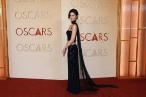 The singer brought understated elegance to the Oscars red carpet in a flowing gown with a delicate scarf drape — a silhouette reminiscent of the classic slim dupatta. File photo/ AFP