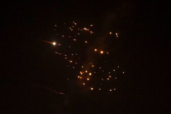 Rocket trails are seen in the sky amid a fresh barrage of Iranian missile attacks above the Israeli coastal city of Netanya on March 18, 2026. (Photo by JACK GUEZ / AFP) 