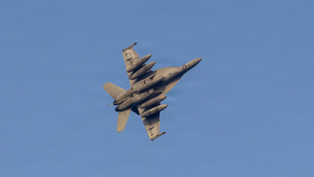 This US Navy handout photo released on March 18, 2026 by US Central Command public affairs, shows a US Navy F/A-18E Super Hornet, attached to Strike Fighter Squadron (VFA) 151, flies over Nimitz-class aircraft carrier USS Abraham Lincoln (CVN 72), during Operation Epic Fury, on March 16, 2026. (AFP) This US Navy handout photo released on March 18, 2026 by US Central Command public affairs, shows a US Navy F/A-18E Super Hornet, attached to Strike Fighter Squadron (VFA) 151, flies over Nimitz-class aircraft carrier USS Abraham Lincoln (CVN 72), during Operation Epic Fury, on March 16, 2026. (AFP)