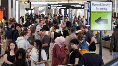 Passengers wait in long TSA lines as a partial government shutdown continues, at Hartsfield-Jackson Atlanta International Airport in Atlanta, Georgia, US, March 20, 2026. File Image/Reuters