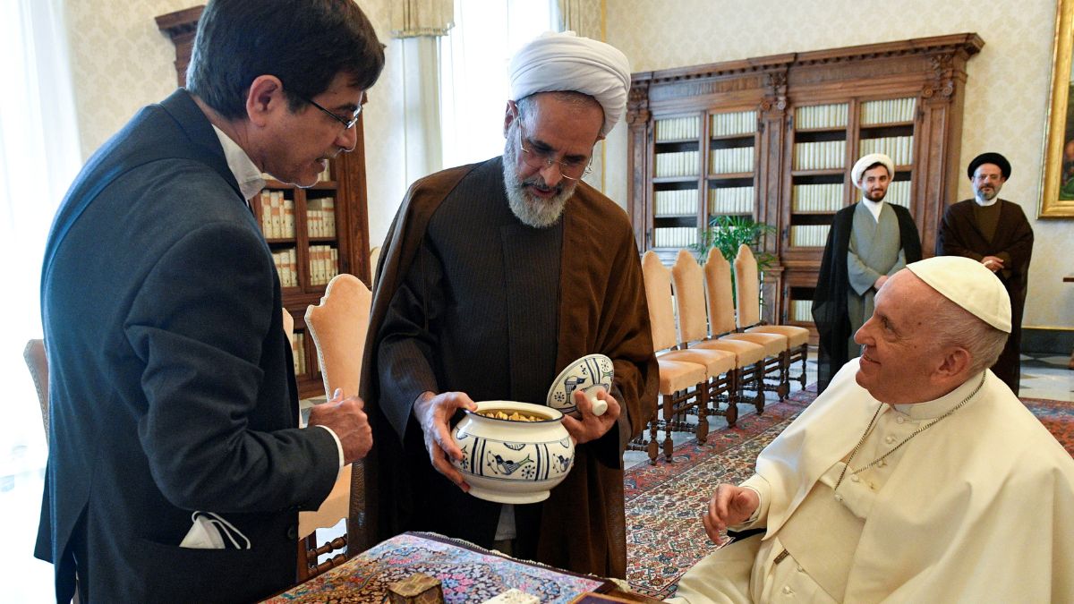 Pope Francis (right) is shown a gift as he receives Ayatollah Alireza Arafi (centre), president of Islamic Seminaries of Iran, and entourage in a private audience at the Vatican, May 30, 2022. File Image/Vatican Media via Reuters Pope Francis (right) is shown a gift as he receives Ayatollah Alireza Arafi (centre), president of Islamic Seminaries of Iran, and entourage in a private audience at the Vatican, May 30, 2022. File Image/Vatican Media via Reuters