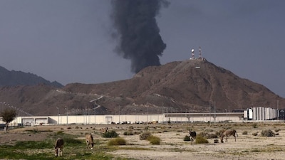 Smoke rises in the Fujairah oil industry zone following a fire caused by debris after interception of a drone by air defenses, according to the Fujairah media office, amid the US-Israel conflict with Iran in Fujairah, United Arab Emirates, on March 3, 2026. (Photo: Amr Alfiky/Reuters) 