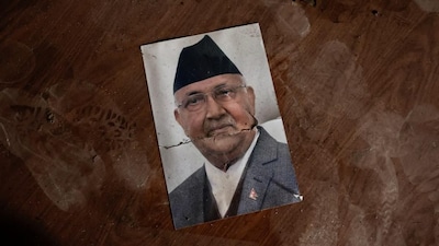 Former Nepal’s Prime Minister KP Sharma Oli’s picture lies on the floor in the Singha Durbar office complex that houses the Prime Minister’s Office and other ministries following arson and vandalism during September 2025 protests. (Photo: Reuters)