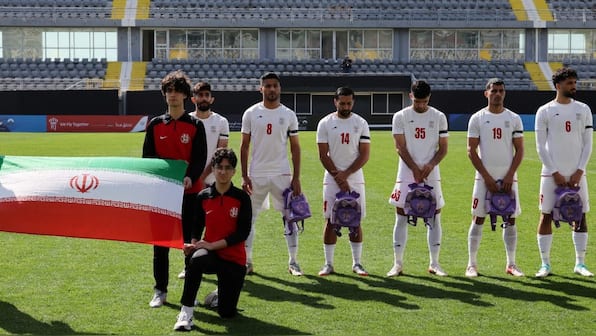 Iran men's football team makes poignant symbolic gesture as uncertainty looms over FIFA World Cup participation
