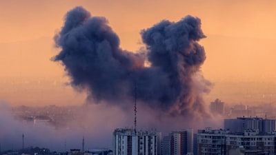 A plume of smoke rises after a strike on the Iranian capital Tehran on March 3, 2026. (Photo: AFP)