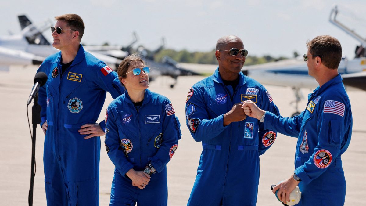 Nasa astronauts Reid Wiseman and Victor Glover greet each other next to Nasa astronaut Christina Koch and CSA (Canadian Space Agency) astronaut Jeremy Hansen, at Kennedy Space Centre, ahead of the Artemis II launch in Cape Canaveral, Florida, US, March 27, 2026. Reuters Nasa astronauts Reid Wiseman and Victor Glover greet each other next to Nasa astronaut Christina Koch and CSA (Canadian Space Agency) astronaut Jeremy Hansen, at Kennedy Space Centre, ahead of the Artemis II launch in Cape Canaveral, Florida, US, March 27, 2026. Reuters