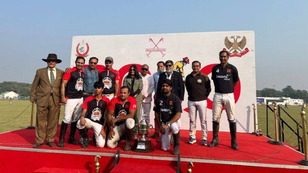 Akshai Malik (second from right), playing for the Jindal Panthers, poses with the playing teams after the final of the APRC Fall Polo Cup, at the Jaipur Polo Ground in New Delhi on November 23, 2025. Anmol Singla/Firstpost