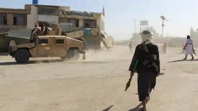 Afghan Taliban fighters patrol along the Afghanistan–Pakistan border in Spin Boldak, Kandahar province, on Wednesday. Image: Reuters
